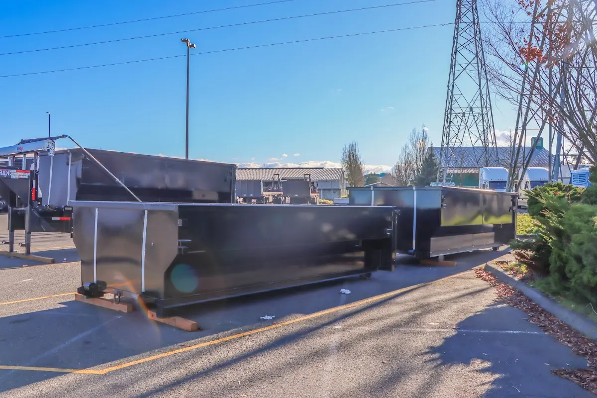 Roll-off dumpster ready for waste disposal at job site for Demolition Dumpster Rental in Lower Gwynedd